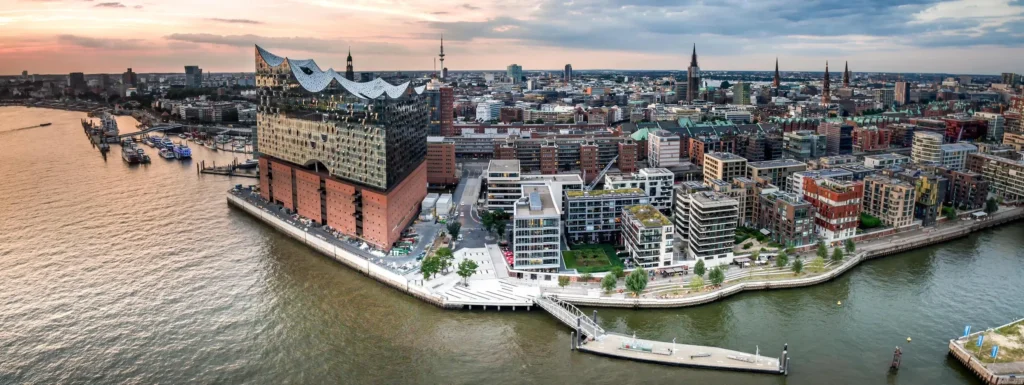 Aerial view of the Hamburg HafenCity with the Elbphilharmonie, the harbor basin, and residential areas